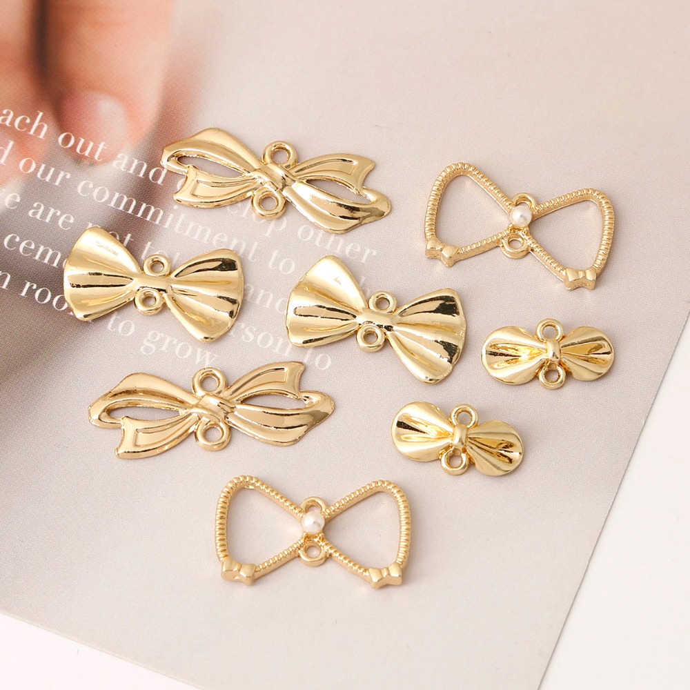 Vintage Fashion Nz - ヴィンテージアンティークゴールドボウペンダントチャーム,ネックレス,ブレスレット,イヤリング,ジュエリー作り,diy,ファッショナブルな結果